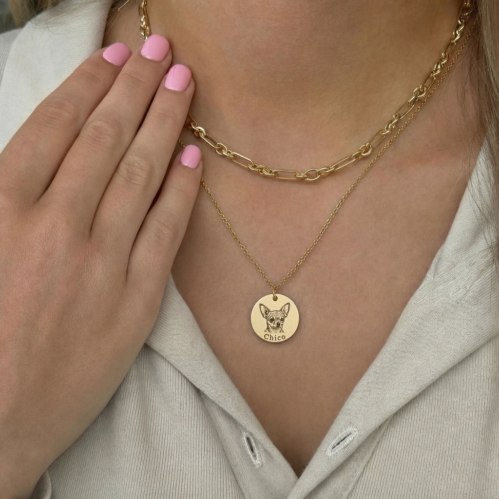 Gold pet portrait necklace worn close to the heart