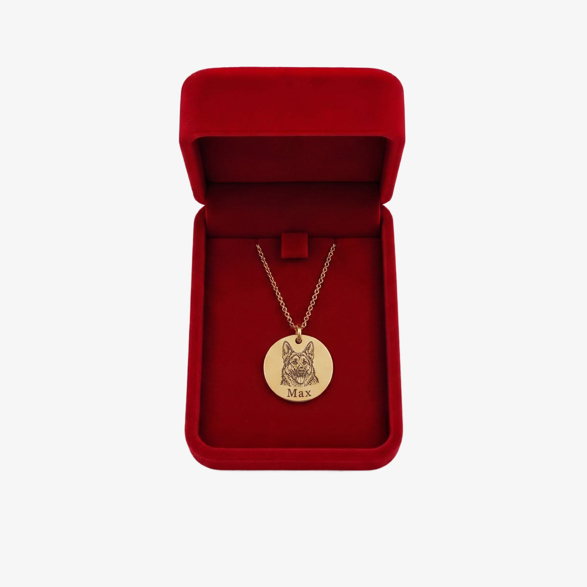 Personalized gold necklace inside the WoofCharm red gift box